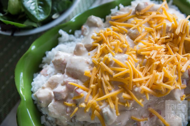cheesy Chicken & Rice // This delicious meal is both simple and tasty. It can also be made in the crock pot for one of those 'set it and forget it' meals. Great for any weeknight or weekend, especially perfect for when you've got friends and family over! | Tried and Tasty