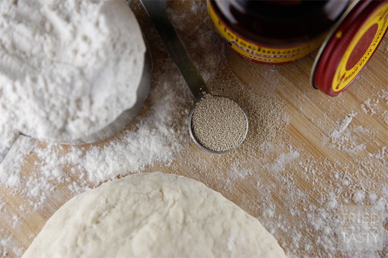 Homemade Pizza Dough // Next to my whole wheat pizza crust, this is hands down my favorite pizza crust. It's absolutely phenomenal and will provide you the perfect pizza every time. Make it today! | Tried and Tasty