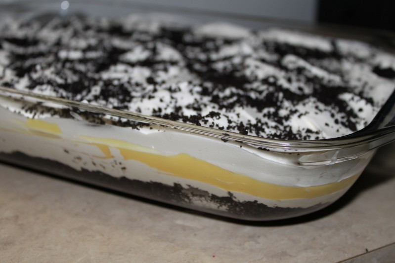 Oreo Torte // There's nothing better than a layered dessert with chocolate, pudding, and whipped cream. Chill this for a bit and you are ready to party! | Tried and Tasty