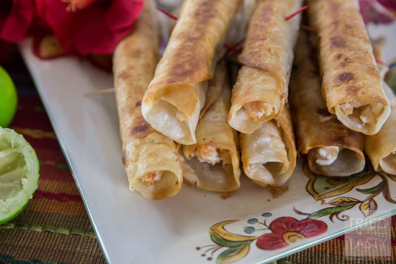Chicken Flautas // These are pretty popular on the menu of Mexican restaurants everywhere. Now you can make them at home. They are absolutely delicious, and with the help of rotisserie chicken they are pretty easy too! | Tried and Tasty