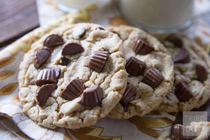 Giant Reese's Peanut Butter Cookies // These giant-sized cookies are a peanut butter lovers dream. Made with Resse's Peanut Butter Cups, peanut butter AND chocolate chips - these will be eaten before they've cooled! | Tried and Tasty