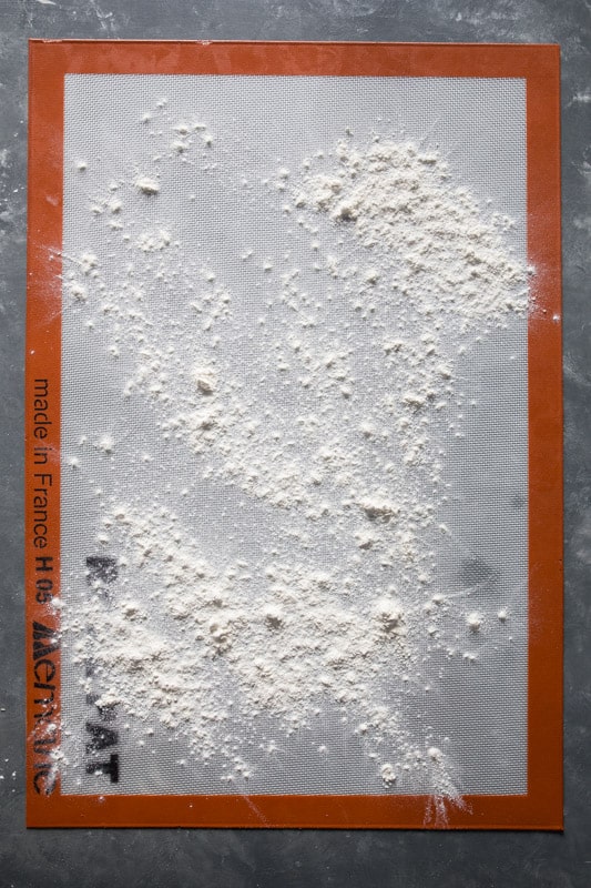 Silicone baking mat sprinkled with flour