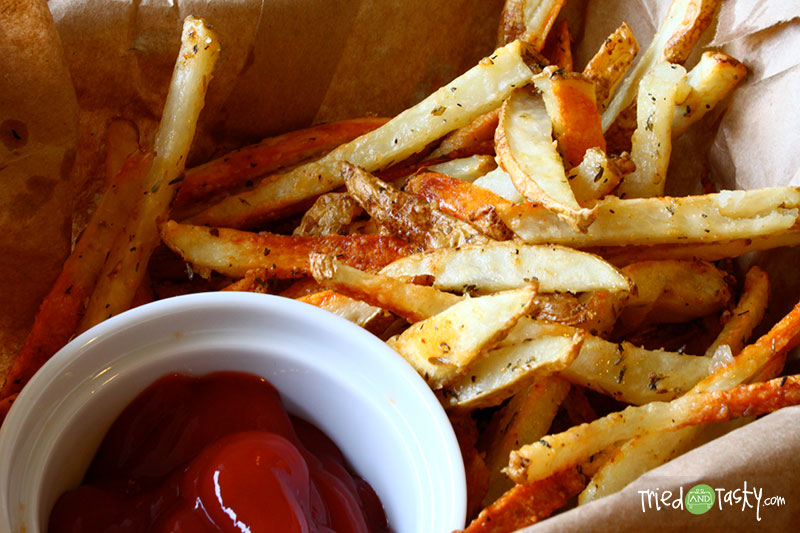 Oven Baked Parmesan Seasoned Fries // These homemade fries are baked for a healthier touch and seasoned to perfection! | Tried and Tasty