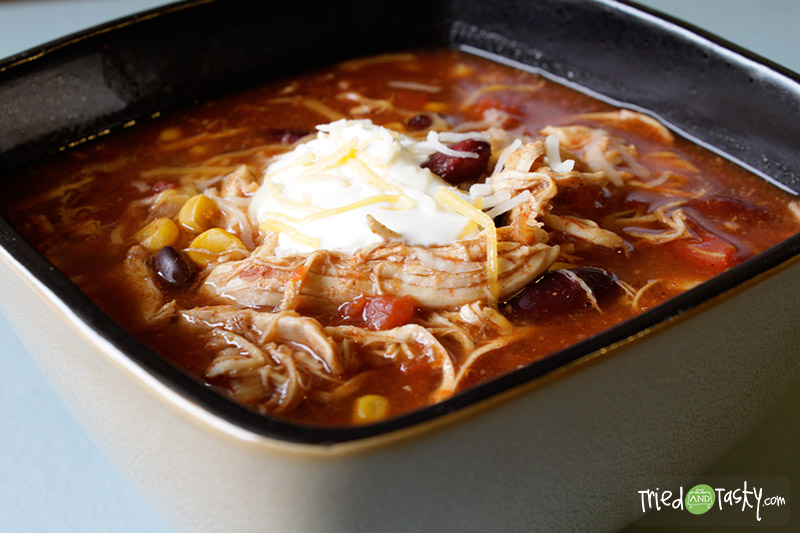 Crock Pot Chicken Taco Chili // This chicken version of Taco Soup is SO good!  And I love that you can just throw all the ingredients in the crock pot and forget it! | Tried and Tasty