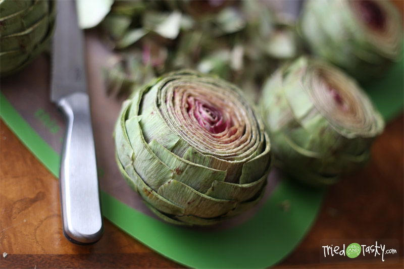 Grilled Artichokes // These grilled artichokes so tasty and pair well with a simple dipping sauce! | Tried and Tasty