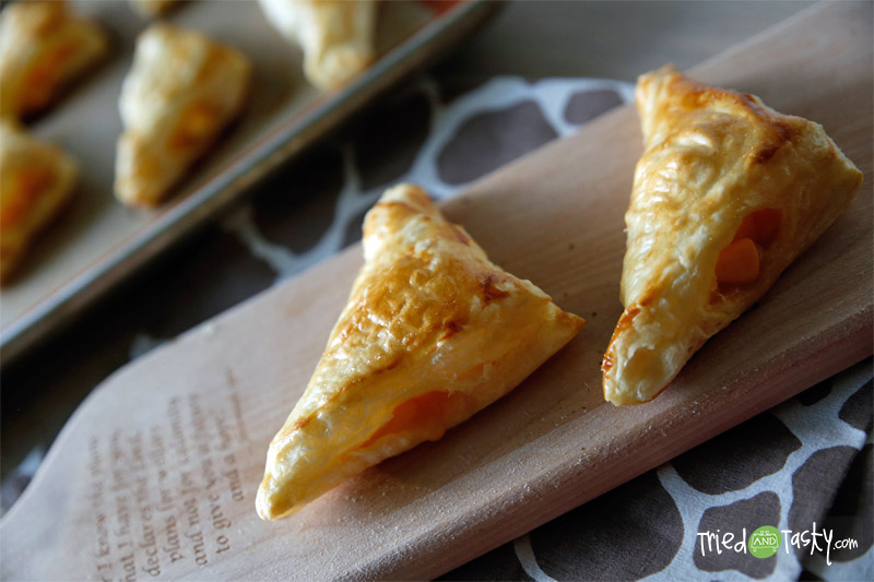 Peach Turnovers // There's nothing quite like biting into a pastry filled with fresh peaches - yum! | Tried and Tasty