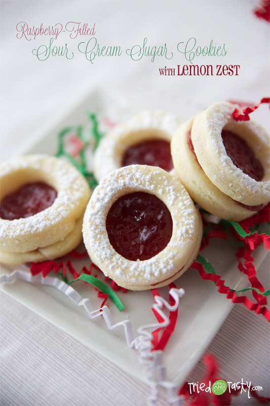 Raspberry-Filled Sugar Cookies with Lemon Zest // Even though the only lemon addition to this recipe is the zest, you’d be surprised what an impact it has.  These sugar cookies are amazing! | Tried and Tasty