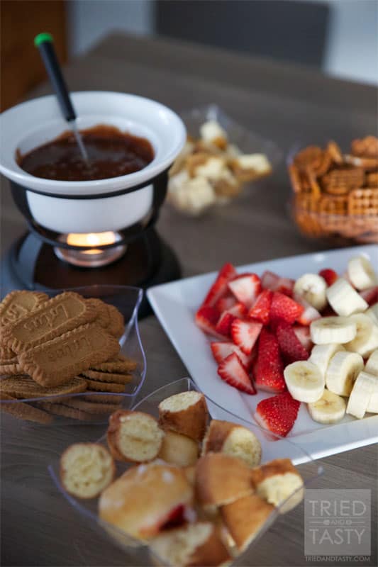 Chocolate Bar Fondue // This wonderful fondue pairs a delicious creamy cheese with sweet raspberries for an out of this world combination. You'll love the sweet surprise! | Tried and Tasty