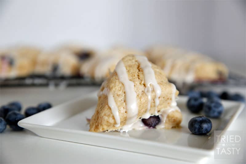 Lemon Glazed Blueberry Scones // A perfect quick breakfast or snack thats easy to make and so delicious the whole family will enjoy them! | Tried and Tasty