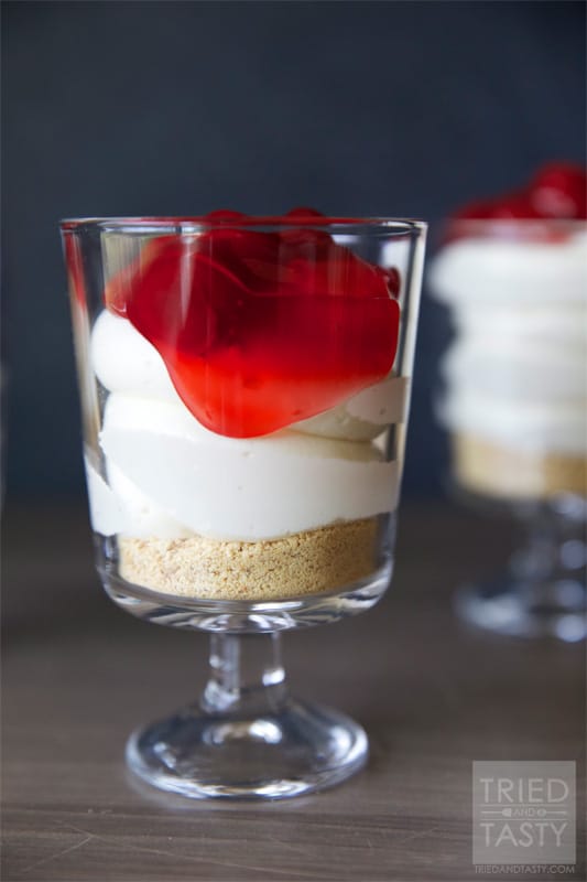 Cheesecake Parfaits // Not only are these Cheesecake Parfaits adorable, they are perfectly portioned. Just keep them in the fridge until you're ready to serve! | Tried and Tasty