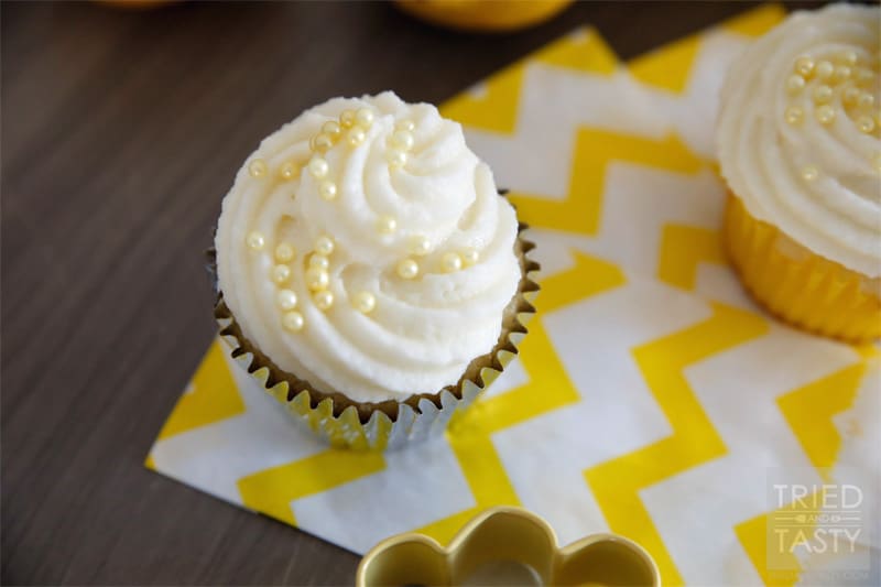 Lemon Curd Filled Cupcakes with Lemon Buttercream Frosting // A yummy lemon filled cupcake that will tickle your tongue and leave you wanting more! | Tried and Tasty