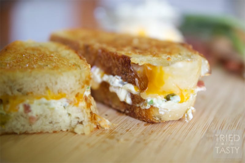 Jalapeno Popper Grilled Cheese Sandwich // If you like traditional jalapeño poppers, you are sure to love this popper transformed grilled cheese. Don't like spicy foods? Don't worry, you can adjust easily to fit any spice tolerance! | Tried and Tasty