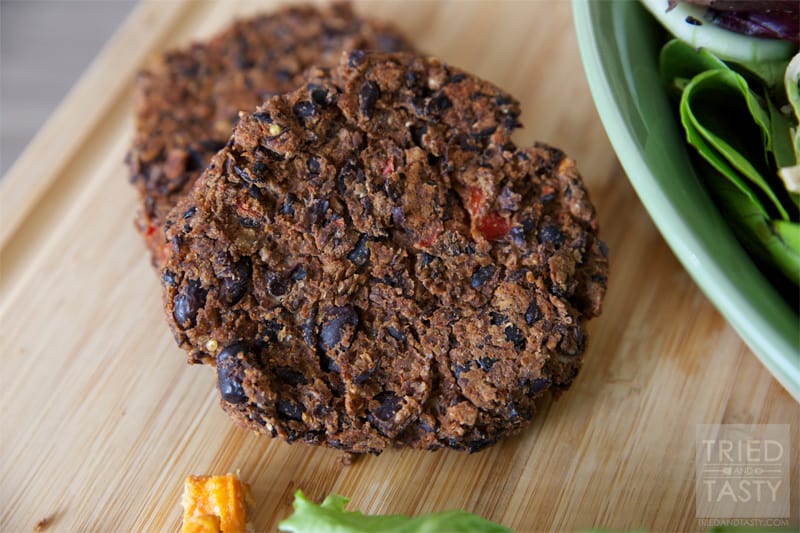Lettuce-Wrapped Homemade Black Bean Veggie Burger // If you're looking for an alternative to the traditional grilled hamburger, why not give this Black Bean Veggie Burger a try? It's delicious, it's healthy, and it's easy to pull together. Make room on your grilling menu this season for this fantastic burger! | Tried and Tasty