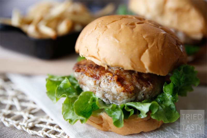 Swiss Turkey Burger // The most amazing ground turkey burger with shredded swiss cheese throughout grilled to perfection! Next time you're grilling, make these! | Tried and Tasty