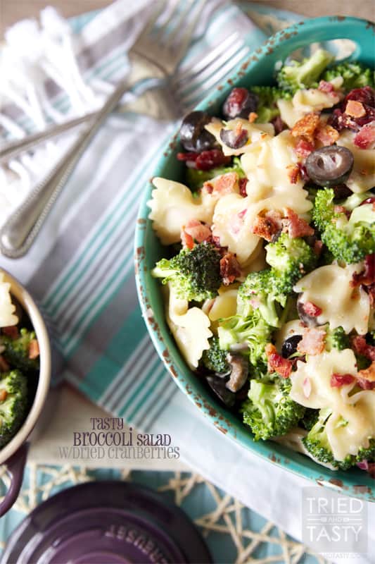 Tasty Broccoli Salad with Dried Cranberries // Need a new salad to take to your next get together? This summery broccoli salad will be an instant hit. Slightly sweet with a little bit of tang, finished off with crunchy bacon bits. Delightful! | Tried and Tasty