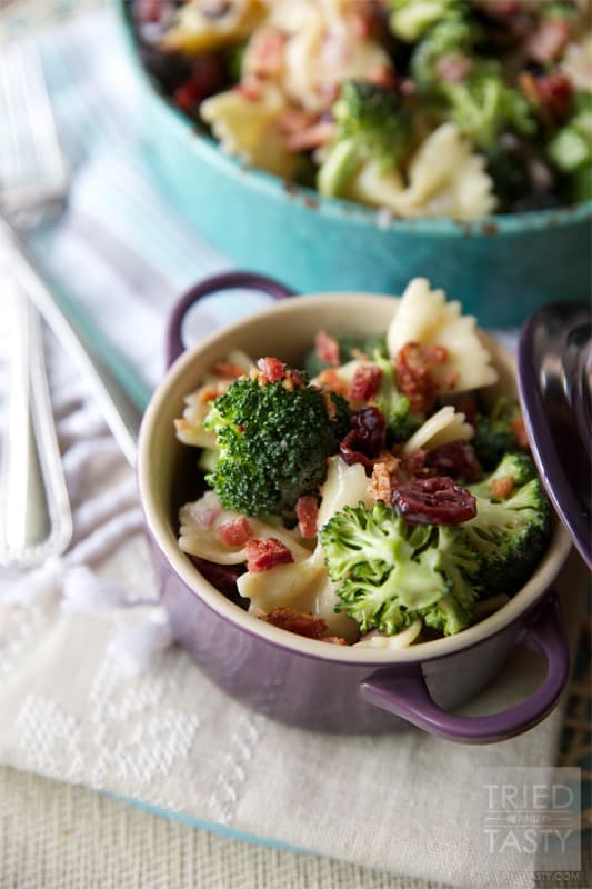 Tasty Broccoli Salad with Dried Cranberries // Need a new salad to take to your next get together? This summery broccoli salad will be an instant hit. Slightly sweet with a little bit of tang, finished off with crunchy bacon bits. Delightful!| Tried and Tasty