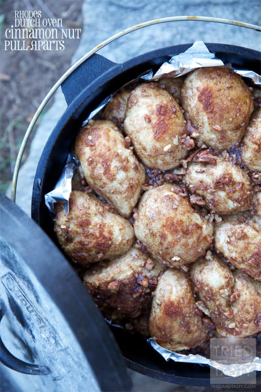 Dutch Oven Cinnamon Nut Pull-Aparts // Five ingredients? So perfect. So easy. And of course, so delicious. All you need is a bag of Rhodes Texas Rolls, some chopped pecans, brown sugar, cinnamon, and butter. That's it! | Tried and Tasty