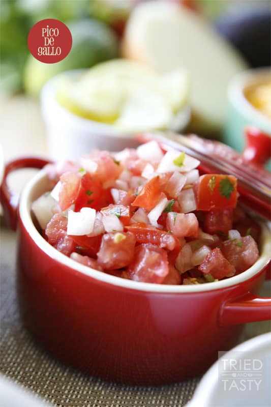 Pico de Gallo // Similar to salsa, Pico De Gallo is a fantastic condiment that can be served with any of your favorite Mexican dishes. Great as a topping on tacos, enchiladas, or salads. Perfect served with chips! Any way you dice it, this flavorful combo will add just what you need to your meal! | Tried and Tasty