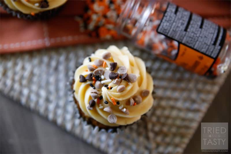 Pumpkin Chocolate Chip Cupcakes w/Pumpkin Cream Cheese Frosting // If you've got canned pumpkin lying around and you aren't sure what to do with it, I would highly suggest making these cupcakes. With the Pumpkin Cream Cheese Frosting, they are pretty much amazing! | Tried and Tasty
