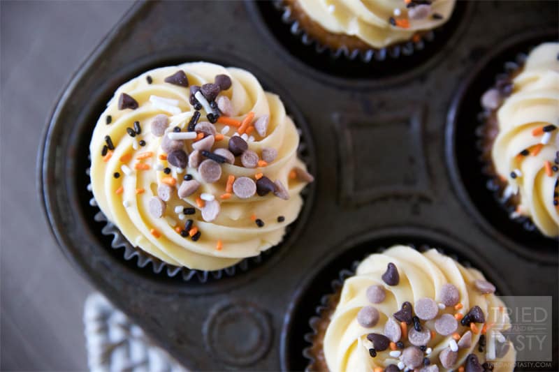 Pumpkin Chocolate Chip Cupcakes w/Pumpkin Cream Cheese Frosting // If you've got canned pumpkin lying around and you aren't sure what to do with it, I would highly suggest making these cupcakes. With the Pumpkin Cream Cheese Frosting, they are pretty much amazing! | Tried and Tasty