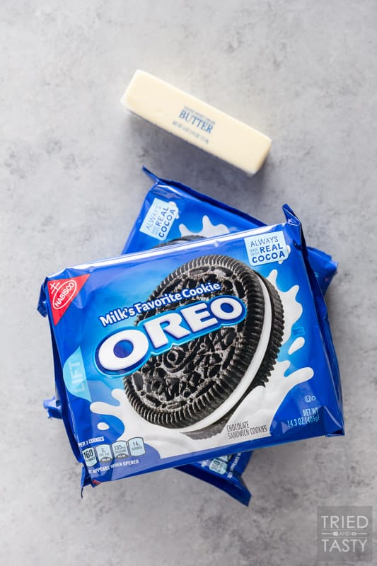 Two packages of Oreo cookies & a stick of butter on the counter