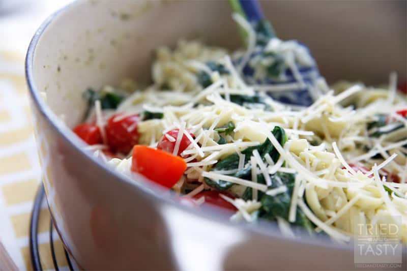 Creamy Spinach Tomato Linguine // A fantastic weeknight meal that you can throw together in a cinch, but looks like you spent hours in the kitchen! The wonderful flavors marry so well together. Tastes great with a slice of your favorite bread! | Tried and Tasty