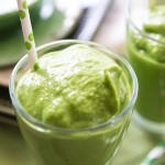 Tropical Green Smoothie // Taste the tropics with this healthy green smoothie! Great for breakfast, snack, or especially post-workout! The tropical flavors will send you back to the island as if you're soaking in sunshine and sipping on coconut! | Tried and Tasty