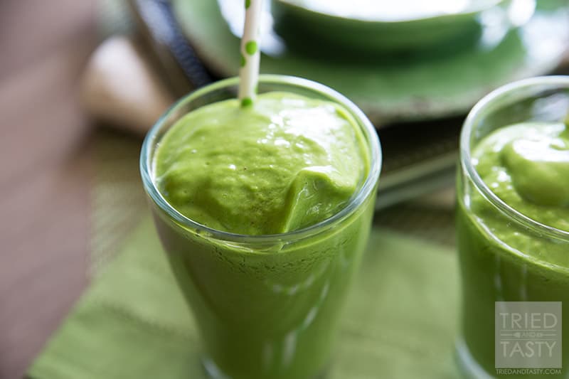 Tropical Green Smoothie // Taste the tropics with this healthy green smoothie! Great for breakfast, snack, or especially post-workout! The tropical flavors will send you back to the island as if you're soaking in sunshine and sipping on coconut! | Tried and Tasty