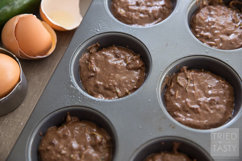 Bakery Style Healthy Chocolate Zucchini Muffins // Do you love bakery style muffins but don't love the long list of unrecognizable ingredients? These Healthy Chocolate Zucchini Muffins are perfect for you! Made without any refined flour or sugar, they are a guilt free breakfast option! | Tried and Tasty
