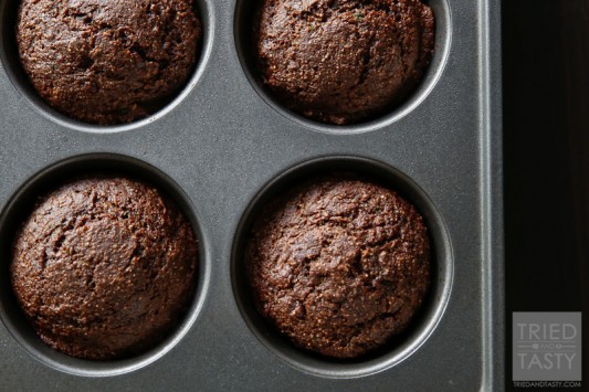 Bakery Style Healthy Chocolate Zucchini Muffins // Do you love bakery style muffins but don't love the long list of unrecognizable ingredients? These Healthy Chocolate Zucchini Muffins are perfect for you! Made without any refined flour or sugar, they are a guilt free breakfast option! | Tried and Tasty
