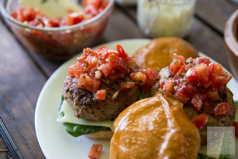 Bruschetta Turkey Burger // The flavors of this tender juicy burger will send you through the roof! Out of this world, you've just got to try it! Add this to your summertime BBQ rotation and you'll look forward to grilling time and time again! | Tried and Tasty