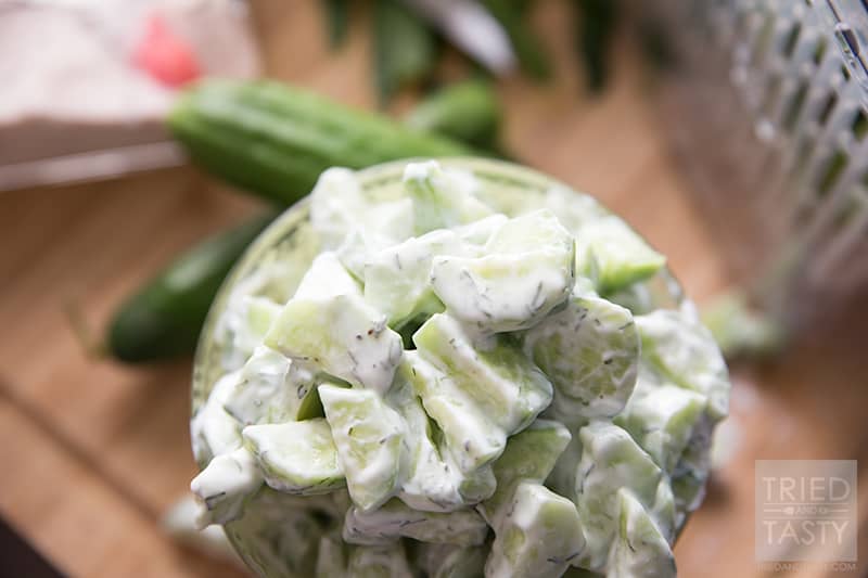 Quick & Easy Cucumber Salad // If you're looking for THE perfect side to your BBQ menu, look no further. This cucumber salad couldn't be easier OR tastier. You've got to try it to believe it. Your guests will be begging for seconds AND the recipe! | Tried and Tasty
