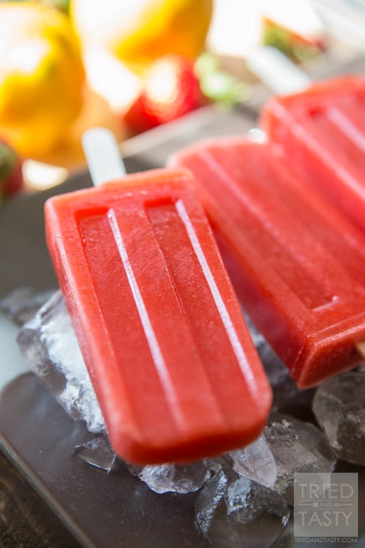 Sweet & Tart Strawberry Lemon Popsicles // Ever made your own popsicles at home? They so simple it's almost hard to believe. You get to avoid yucky artificial flavorings, colors, and ingredients and can feel great about what you are feeding your family! Made with only fruits, you'll love the taste of these swet & tart popsicles! | Tried and Tasty