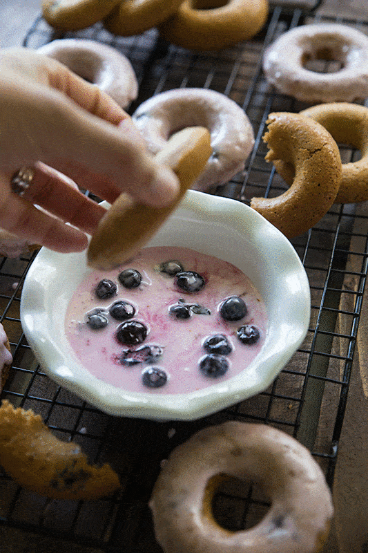 Baked Gluten Free Lemon Blueberry Doughnuts // If you are a doughnut lover but don't want all of the extra calories and sugar, give these baked doughnuts a try. With a little bit of citrus paired with plump & juicy blueberries - these are perfect for breakfast or dessert! | Tried and Tasty