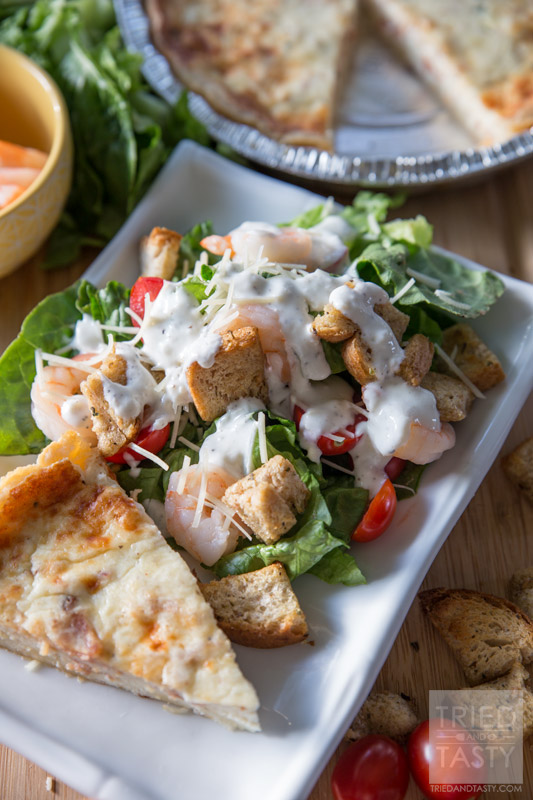 Shrimp Caesar Salad // Looking for a delicious twist on Caesar Salad with a healthy flair? This Shrimp Caesar Salad recipe is topped with a guilt free dressing and paired with the most delicious La Terra Fina Quiche make the most wonderful meal! | Tried and Tasty