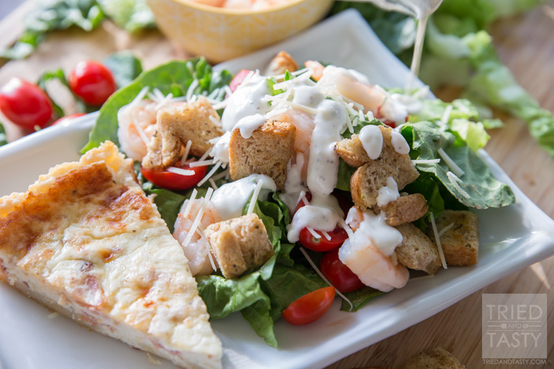 Shrimp Caesar Salad // Looking for a delicious twist on Caesar Salad with a healthy flair? This Shrimp Caesar Salad recipe is topped with a guilt free dressing and paired with the most delicious La Terra Fina Quiche make the most wonderful meal! | Tried and Tasty