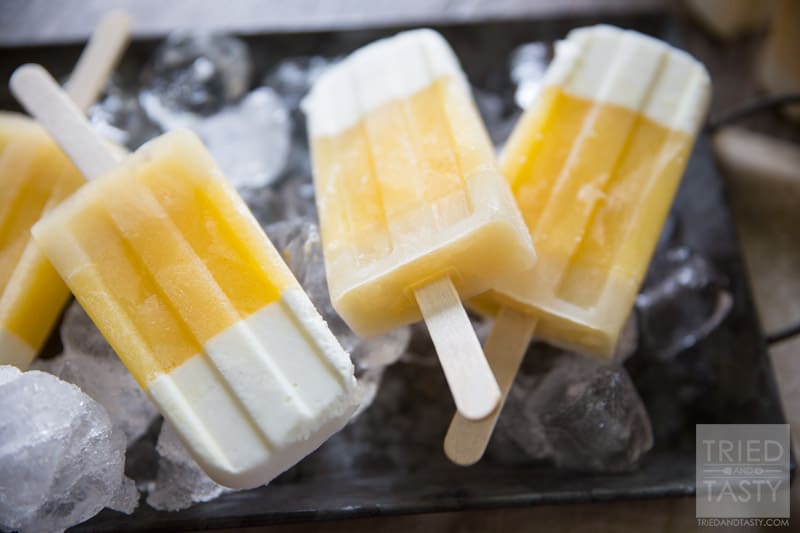 Tropical Candy Corn Popsicles // This 'candy corn' inspired treat is a healthy variation for all of your guilt-free treat needs! Perfectly tropical with the flavors of coconut, pineapple and orange you're tastebuds will say THANK YOU! | Tried and Tasty