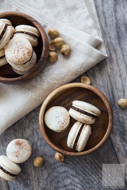 Classic French Macarons with Homemade Nutella Filling // These tasty little one-bite treats are made ever so slightly healthier with a homemade Nutella center. Crispy. Dainty. Delicious | Tried and Tasty