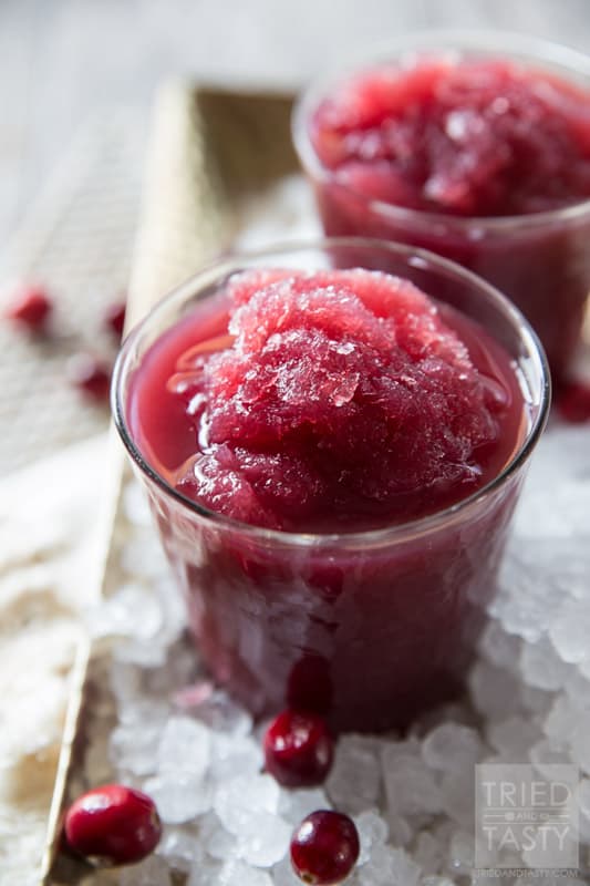 Cran-Pomegranate Citrus Slushie // The tangy flavors of this power packed slushie will have your tastebuds dancing to a new tune! Non-alcoholic and perfect for all of the guests at your holiday party! | Tried and Tasty