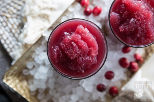 Cran-Pomegranate Citrus Slushie // The tangy flavors of this power packed slushie will have your tastebuds dancing to a new tune! Non-alcoholic and perfect for all of the guests at your holiday party! | Tried and Tasty