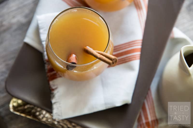 Healthy Citrus Wassail // Warm up with this cozy citrus drink this winter. Non-alcoholic makes it great for the whole family to enjoy. Made without any refined-sugar it's the perfect alternative to the typical sugar loaded drinks! | Tried and Tasty