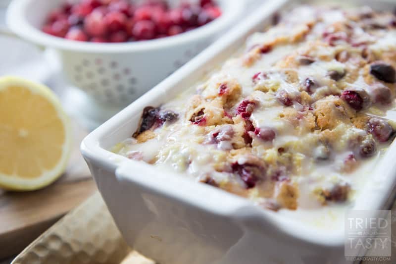 Lemon Cranberry Bread // This gorgeous citrus sweet bread is not only a stunner, but perfect for your holiday dessert table. A little bit of tart, a little bit of sweet, and a whole lot of delicious! | Tried and Tasty