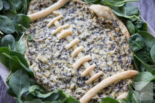 Football Spinach & Artichoke Dip // This two ingredient appetizer is sure to be a hit at your next game day party. Made with only two ingredients you can while this up in little to no time. Serve with your favorite veggies or chips! | Tried and Tasty