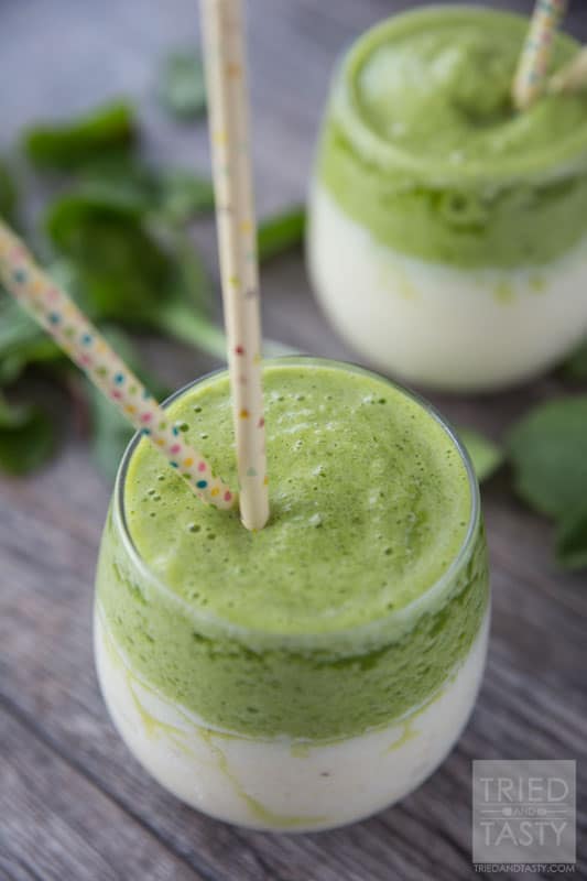 Pineapple Banana Layered Green Smoothie // Not quite ready to take the leap into the world of green smoothies? Try this layered version with a mix of pineapple and banana frozen goodness. The flavors combine to make an out-of-this-world blended drink! | Tried and Tasty