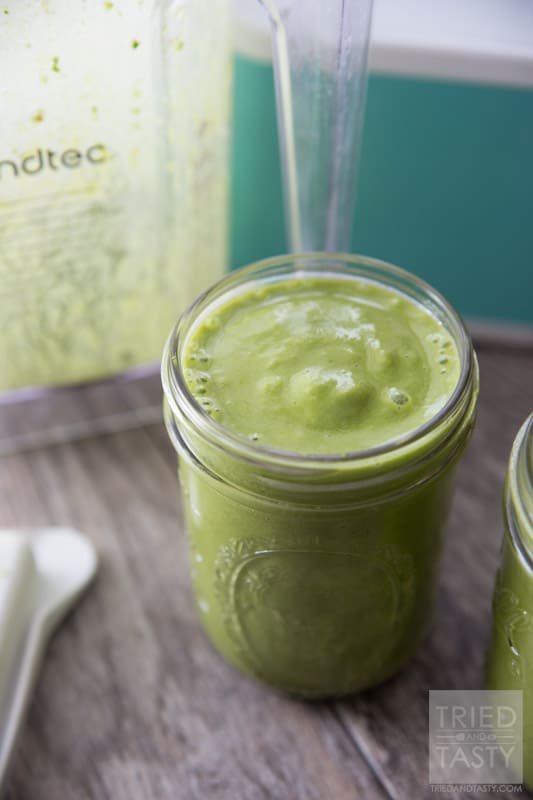 Three Ingredient Pineapple Green Smoothie // Doesn't get any easier than this delicious smoothie! You're only three ingredients away from a nutrition packed, no-sugar added, simple smoothie. Perfect to jump start your morning. Great for a mid-afternoon pick-me-up. Great for an afternoon snack the whole family will enjoy! | Tried and Tasty