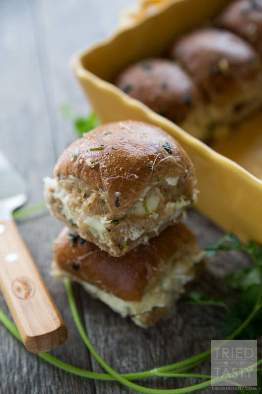 Cheesy Artichoke Mozzarella Sliders // You're only five ingredients away (six if you count parsley) from these awesome cheesy sandwiches! They are great for the Super Bowl, March Madness, or any other gathering with a large crowd. Everyone will fall in love with this tasty appetizer! | Tried and Tasty