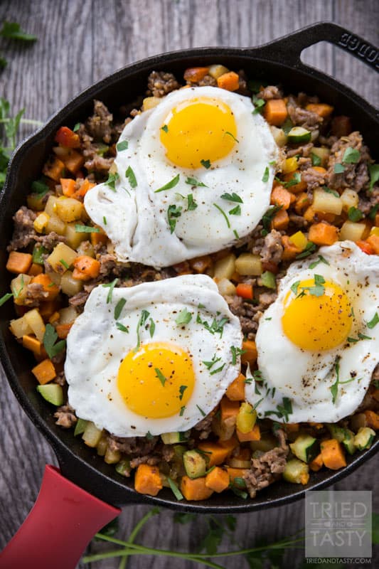 Sweet Potato & Sausage Breakfast Hash // Looking for a filling, delicious, and healthy breakfast? This sweet potato & sausage hash is an excellent choice. Loaded with veggies and more - you'll want to start every morning with this tasty dish! | Tried and Tasty