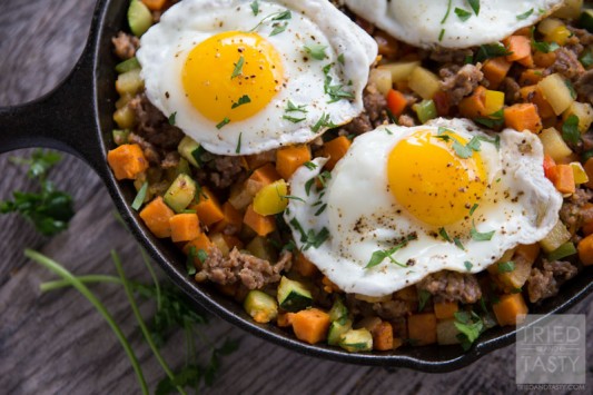 Sweet Potato & Sausage Breakfast Hash // Looking for a filling, delicious, and healthy breakfasT? This sweet potato & sausage hash is an excellent choice. Loaded with veggies and more - you'll want to start every morning with this tasty dish! | Tried and Tasty