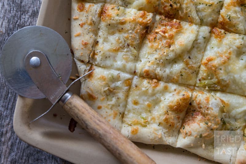 Two Cheese Focaccia // This delicious bread is not only quick & easy, but perfect all by itself OR great to make sandwiches with! Whip this together in no time at all, throw together a turkey & avocado sandwich, then enjoy the perfect lunch! | Tried and Tasty
