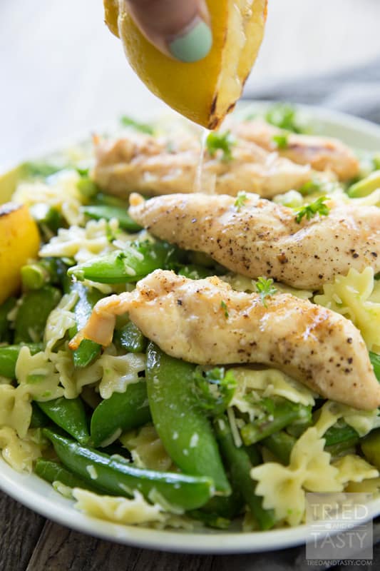Hot Asparagus, Snap Pea, and Avocado Pasta Salad // This delicious pasta served with grilled chicken and lemon is the perfect dish to serve for any special occasion. Avocado lovers will swoon over the smooth, creamy, and flavorful incorporation into this tasty dinner idea! | Tried and Tasty